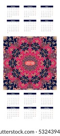 Beautiful vertical calendar for 2018 year on ethnic ornamental background - 1. Mandala pattern. Week starts on monday . Russian language.