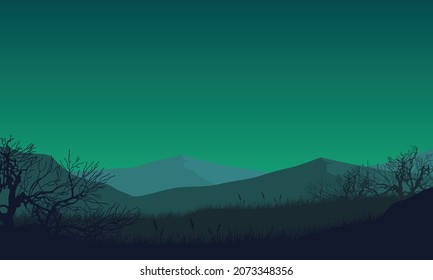 Beautiful view of mountains with an aesthetic silhouette of dry trees from the edge of town at night. Vector illustration of a city