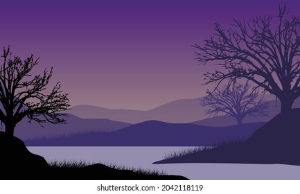 Beautiful view of the mountains from the riverbank at night with the silhouettes of dry trees around it. Vector illustration of a city