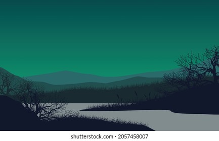 Beautiful view of the mountains from the riverbank at night with the silhouettes of dry tree branches around it. Vector illustration of a city