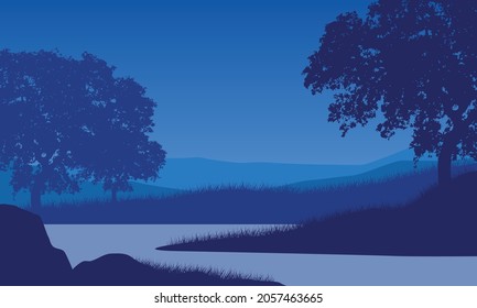 Beautiful view of the mountains from the riverbank at night with the silhouettes of large trees around it. Vector illustration of a city