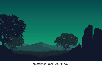 The beautiful view of the mountains with the silhouette of large trees from the countryside at night. Vector illustration of a city