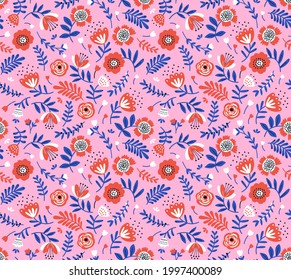 Beautiful vintage floral pattern in small folk flowers. Small red flowers. Bright pink background. Liberty style print. Floral seamless background. The elegant the template for fashion prints.