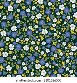 Beautiful vintage floral pattern. White , blue and yellow flowers . green leaves. Dark green background. Floral seamless background. An elegant template for fashionable prints.