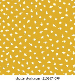 Beautiful vintage pattern. Small White flowers . Yellow background. Floral seamless background. An elegant template for fashionable prints.