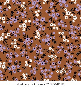 Beautiful vintage pattern. Small white and lilac flowers, black leaves. Terracotta background. Floral seamless background. An elegant template for fashionable prints.