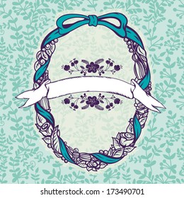 Beautiful vintage wreath with bow, ribbon, roses and jewelry elements.