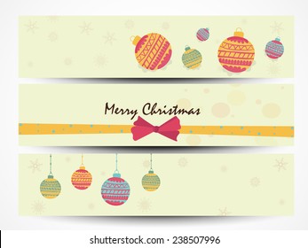 Beautiful website header or banner set with X-mas Balls and ribbon for Merry Christmas celebration.
