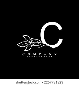 beautiful white C logo design with luxury flower. Initial C monogram symbol. flourish logo. suitable for logos of beauty, spa,salon,boutique,company,business,hotel,brand,etc