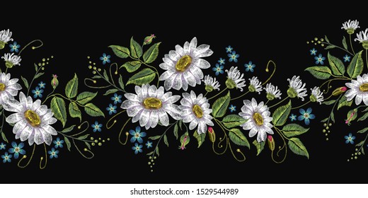 Beautiful white chamomiles horizontal seamless pattern. Embroidery on black background. Template for clothes, textiles, spring flowers 