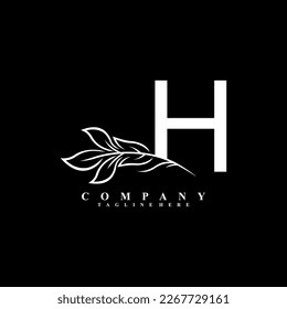 beautiful white H logo design with luxury flower. Initial H monogram symbol. flourish logo. suitable for logos of beauty, spa,salon,boutique,company,business,hotel,brand,etc