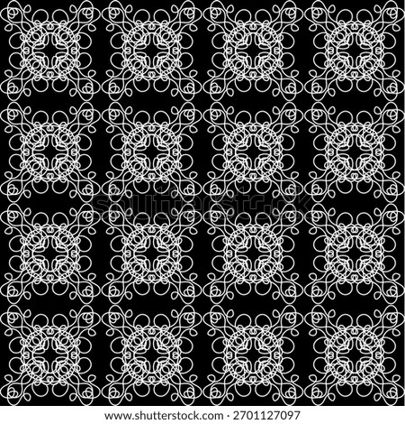 A beautiful white lace pattern on a black background. Seamless pattern for fabric or wallpaper.
