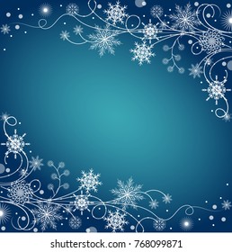 Beautiful winter frame made of snowflakes on blue background.