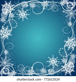 Beautiful winter frame made of snowflakes on blue background.