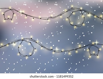 Beautiful winter greeting banner with blurred background, Glowing garland and bokeh effect.