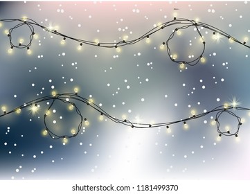 Beautiful winter greeting banner with blurred background, Glowing garland and bokeh effect.