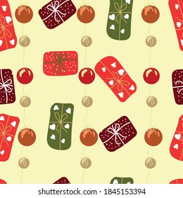 Beautiful winter seamless pattern for gift boxes. Warm and cozy combination of Christmas colors. New year 2021 pattern with gift boxes and colorful Christmas balls on a light yellow background.
