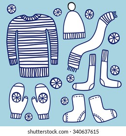 Beautiful winter vector set. Warm clothing. Pullover, cap, scarf, mittens, socks, boots.