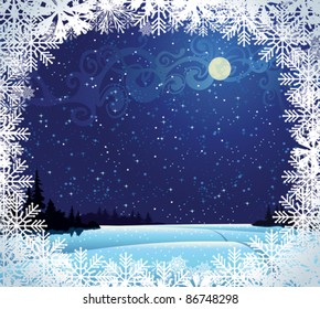 Beautiful wintry landscape with night sky, snow-covered nature and light moon