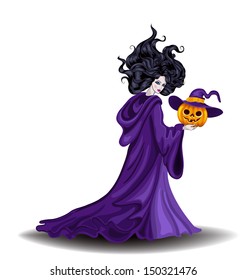Beautiful witch with pumpkin in Halloween day