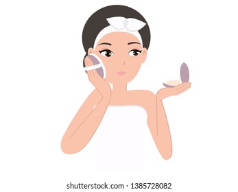 Beautiful woman and apply powder foundation and concealer