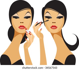 Beautiful woman applying make up