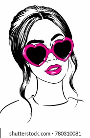 beautiful woman face in sunglasses heart