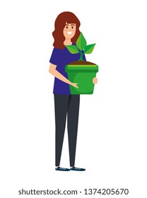 beautiful woman lifting houseplant in pot