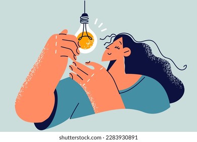 Beautiful woman with light bulb symbolizing promising idea or brilliant thought invented by human. Girl independently changes light bulb hanging on wire to repair or restore lighting in room