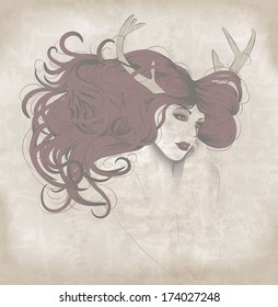 Beautiful woman with long hair and antlers