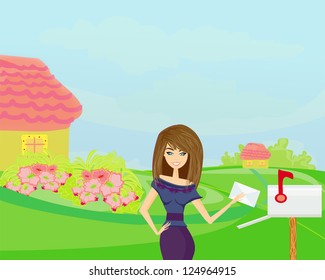 Beautiful woman with a mailbox