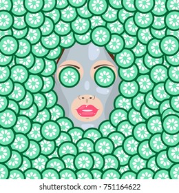 Beautiful woman with a mask on her skin. She cares her skin.Cucumbers on her eyes. Cucumbers on the background.