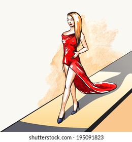 Beautiful woman model walking on the runway, shows the red dress with train