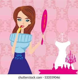 Beautiful woman putting lipstick on