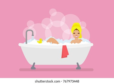 beautiful woman relaxing in bathtub