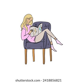 Beautiful woman sitting and reading a magazine