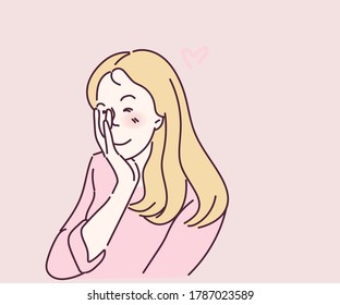 Beautiful woman smiling and covering herself half face, she in love and shy. Hand drawn in thin line style, vector illustrations.