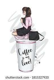 A beautiful woman in stylish clothes is sitting on a large glass of coffee. Fashion and style, clothing and accessories. Vector illustration.
