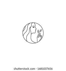 Beautiful woman's face holding flower leaf logo design template. Hair, girl, leaf symbol. Elegant design concept for flower shop, beauty salon, massage, cosmetic and spa. Premium vector icon