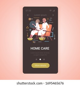beautiful women applying face masks and foot basin with soap water girls in bathrobes relaxing skincare spa treatment concept smartphone screen online mobile app copy space full length vector