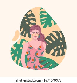 Beautiful women on the background of exotic plants. Summer template.