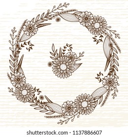 A beautiful wreath with flowers and leaves. Wreath from field flowers. Natural wreath for inscriptions, postcards, invitations and background.