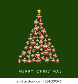 Beautiful Xmas tree decorated by Christmas balls and golden star on green background for Merry Christmas and Happy New Year celebration background. 