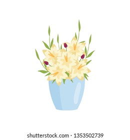 Beautiful yellow lilies flowers in blue wide vase on empty background