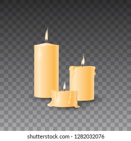 Beautiful yellow vector set of realistic burning candles on transparent background.   