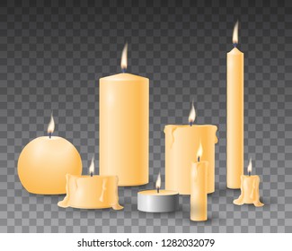 Beautiful yellow vector set of realistic burning candles on transparent background.   