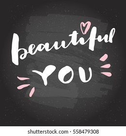 Beautiful you. Hand lettering on blackboard background. Valentine's day hand lettering greeting card. Love message on blackboard. Photo overlay, T-shirt or bag print. Modern calligraphy in vector.