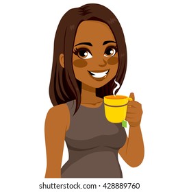 Beautiful young African American woman having herbal tea infusion