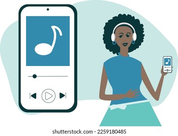 A beautiful young African girl in wireless headphones listens to music from her smartphone. A woman enjoying music.