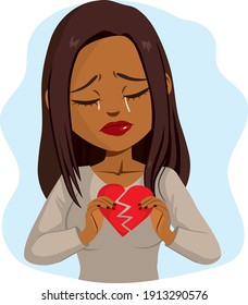 Schöne junge Schwarze weinen traurig, während sie ein gebrochenes Herzkonzept